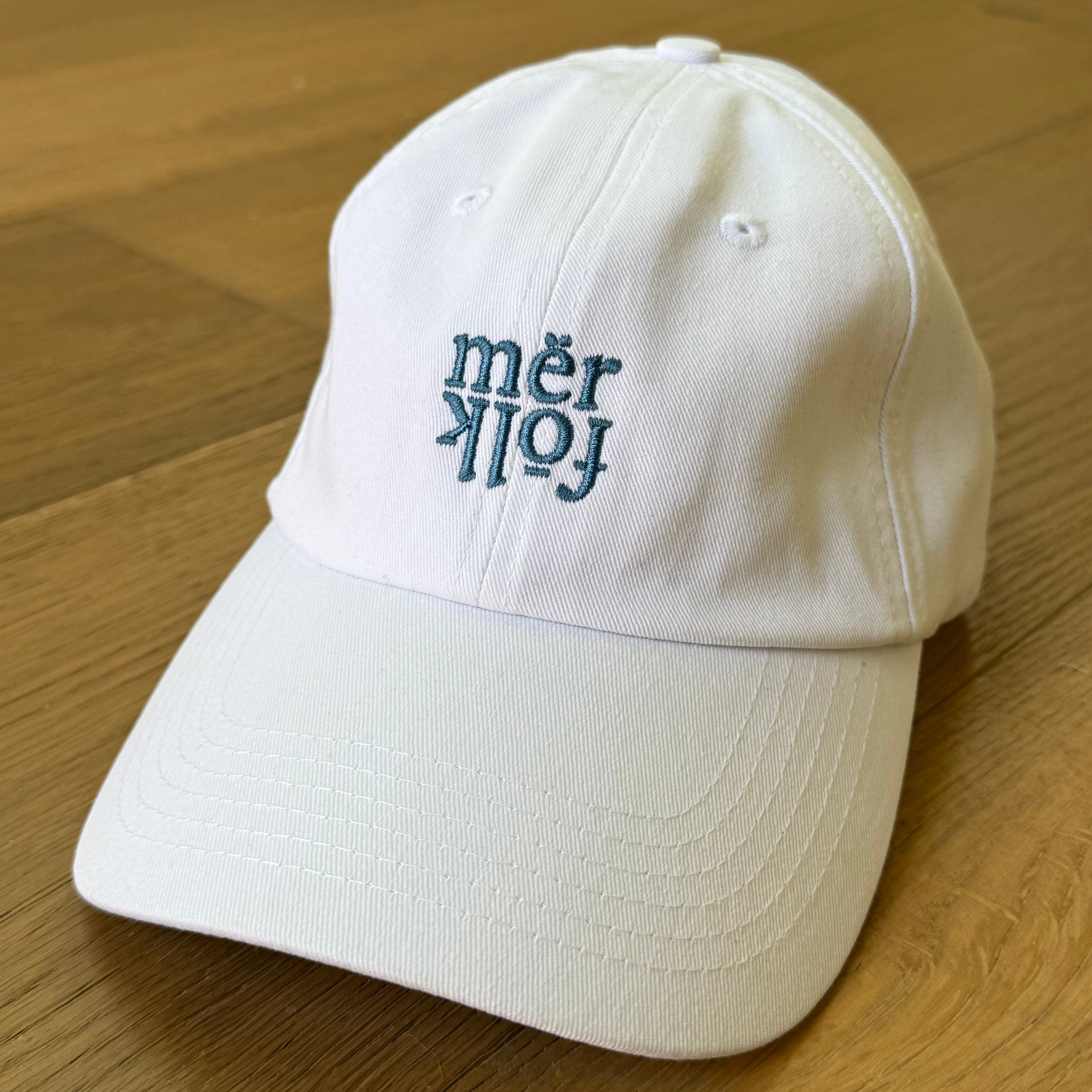 mërfōlk alt logo cap- white and blue